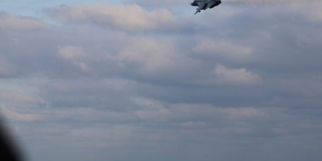 A Russian Su-24 jet passes within close proximity of the guided-missile destroyer USS Porter in an aggressive action taken by Russia on Friday.