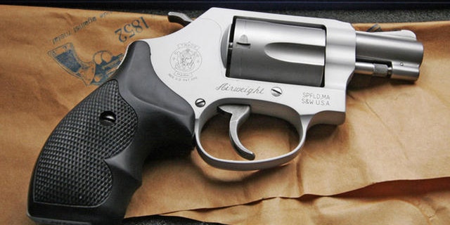 Vivian Westerman's new .38 revolver is seen in the gun's case case in New Orleans, Tuesday, March 13, 2007. Sixty-four-year-old Vivian Westerman rode out Hurricane Katrina in her 19th-century house. So terrible was the experience that she wanted two things before the 2006 season arrived: a backup power source and a gun. (AP Photo/Alex Brandon)