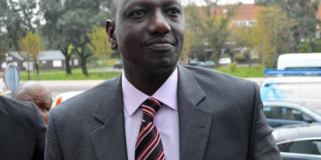 Kenyan Deputy President William Ruto arrives at the International Criminal Court in The Hague on September 23, 2013