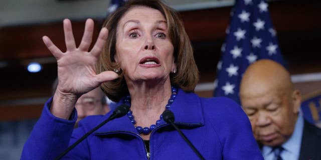 House Minority Leader Nancy Pelosi of Calif., joined at right by Rep. Elijah Cummings, D-Md., ranking member of the House Oversight and Government Reform Committee, speaks during a news conference on Capitol Hill in Washington, Tuesday, Feb. 14, 2017, calling for an investigation into President Donald Trump's relationship with Russia, including when Trump learned that his national security adviser, Michael Flynn, had discussed U.S. sanctions with a Russian diplomat. (AP Photo/J. Scott Applewhite)