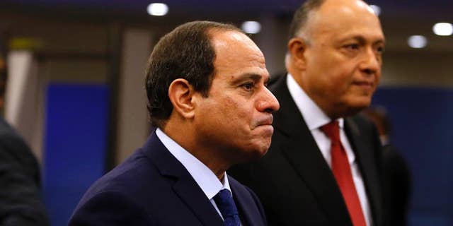FILE - In this Monday, Sept. 28, 2015 file photo, Egypt's President Abdel Fattah el-Sissi arrives for the 70th session of the United Nations General Assembly at U.N. headquarters. In just the last three weeks, according to rights lawyers, nearly 1,300 were detained by police as the highly militarized force went after organizers and demonstrators protesting the surrender of control over two Red Sea islands to Saudi Arabia in a deal that raised suspicions about a sell-off. (AP Photo/Jason DeCrow, File)