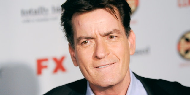 Actor Charlie Sheen arrives at the Hollywood FX Summer Comedies Party in Los Angeles, California June 26, 2012.