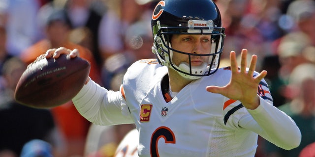 Chicago Bears quarterback Jay Cutler passes during the first half of a NFL football game against the Washington Redskins in Landover, Md., Sunday, Oct. 20, 2013. (AP Photo/Alex Brandon)