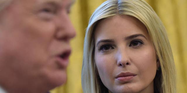 Ivanka Trump, listens as her father President Donald Trump, talks via a video conference to astronauts on the International Space Station, Monday, April 24, 2017, from the Oval Office of the White House in Washington. (AP Photo/Susan Walsh)