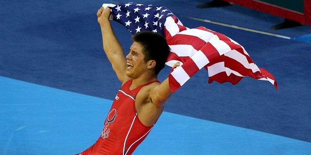A photo of Henry Cejudo after winning gold at the 2008 Summer Games.