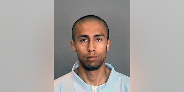 FILE - This undated file photo provided by the Anaheim Police Department shows Itzcoatl Ocampo. Ocampo a former Marine accused of murder in the deaths of four homeless men, a woman and her son has died at a California hospital after falling ill in his jail cell. (AP Photo/Anaheim Police Department, File)