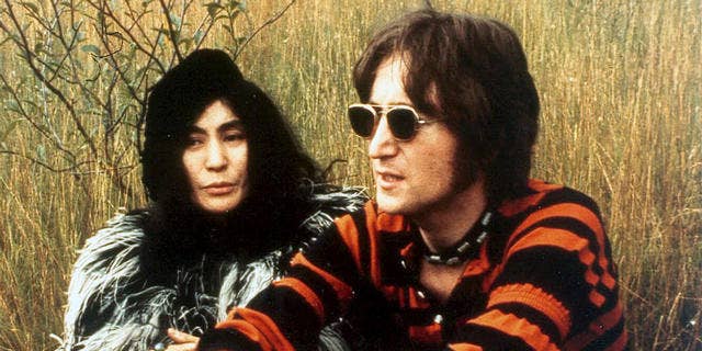 Yoko Ono and John Lennon are shown together in 1970.