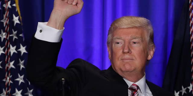 President Donald Trump gestures while speaking at the Republican congressional retreat in Philadelphia, Thursday, Jan. 26, 2017. (AP Photo/Matt Rourke)