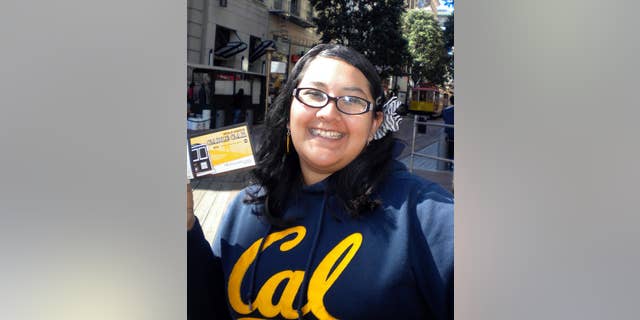 FILE - This undated file photo provided by Tatiana Ward shows Aurora Godoy during a trip to San Francisco. Godoy was killed during a Dec. 2, 2015, attack in San Bernardino, Calif. Los Angeles Harbor College says it will honor the memory of Godoy by awarding her a posthumous degree recognizing her as a member of its Class of 2016 during a board of trustees meeting Wednesday, May 11, 2016. (Tatiana Ward via AP, File)