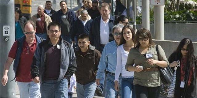 Jurrors and court workers, a cross section of Orange County, leave the Santa Ana, Calif. courthouse on Tuesday, March 8, 2011. Surging Latino and Asian populations accounted for virtually all of California’s population growth over the last decade, new Census data shows.