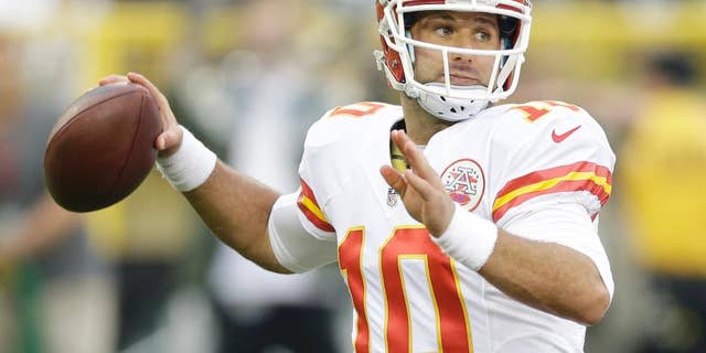 Kansas City Chiefs quarterback Chase Daniel throws during the first half of an NFL football preseason game against the Green Bay Packers Thursday, Aug. 28, 2014, in Green Bay, Wis. (AP Photo/Tom Lynn)