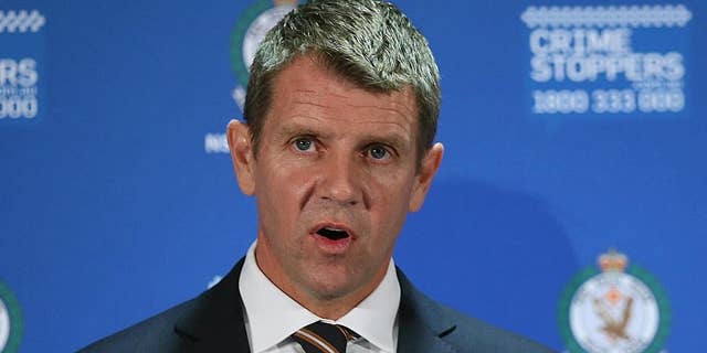 FILE - In this Dec. 16, 2015 file photo, New South Wales Premier Mike Baird speaks to the media during a press conference after a Lindt cafe siege at Martin Place in the central business district of Sydney, Australia. The leader of Australia's most populous state resigned Thursday, Jan. 19, 2017, after his popularity plummeted over a series of decisions during 2016. Baird used social media to announce that the ruling Liberal Party would elect a new leader at a meeting on Tuesday. (AP Photo/Rob Griffith, File)