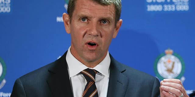 FILE - In this Dec. 16, 2015 file photo, New South Wales Premier Mike Baird speaks to the media during a press conference after a Lindt cafe siege at Martin Place in the central business district of Sydney, Australia. The leader of Australia's most populous state resigned Thursday, Jan. 19, 2017, after his popularity plummeted over a series of decisions during 2016. Baird used social media to announce that the ruling Liberal Party would elect a new leader at a meeting on Tuesday. (AP Photo/Rob Griffith, File)