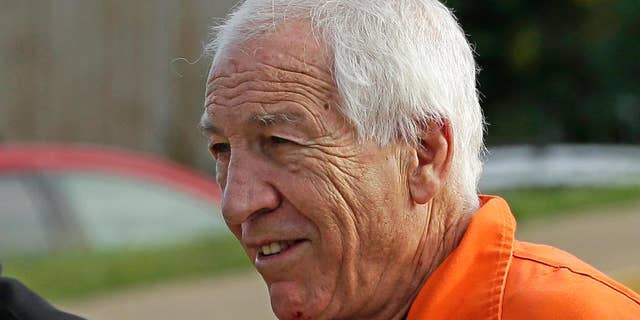 Former Penn State University assistant football coach Jerry Sandusky arrives at the Centre County Courthouse for an appeals hearing.