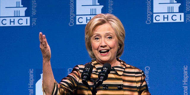 Democratic presidential candidate Hillary Clinton speaks to the Congressional Hispanic Caucus Institute's 39th Annual Gala Dinner held at the Washington Convention Center, in Washington, Thursday, Sept. 15, 2016. Clinton returned to the campaign trail after a bout of pneumonia that sidelined her for three days and revived questions about both Donald Trump's and her openness regarding their health..( AP Photo/Jose Luis Magana)