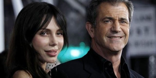 Mel Gibson with ex-girlfriend Oksana Grigorieva, whose sister allegedly leaked tapes of Mel's rants.