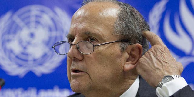 UN special rapporteur on torture and other cruel, inhuman and degrading treatment or punishment Juan Mendez, gestures during a media briefing in Colombo, Sri Lanka, Saturday, May 7, 2016. (AP Photo/Eranga Jayawardena)