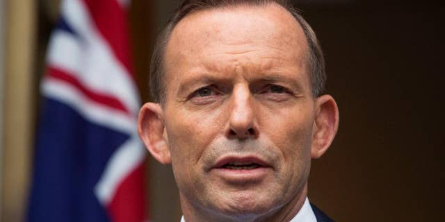 FILE - In this Feb. 9,. 2015 file photo, Australian Prime Minister Tony Abbott answers questions at a media conference before attending the parliament's question time in Canberra. Australia's gaffe-prone prime minister took back his second Nazi-related comment in a month on Thursday, March 19 after he compared the opposition party leader to German World War II-era propaganda minister Joseph Goebbels. (AP Photo/Andrew Taylor, File)