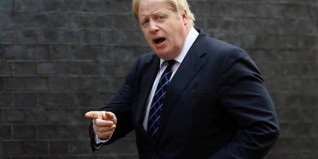 FILE - In this Tuesday, March 22, 2016 file photo, Boris Johnson arrives for a meeting at Downing Street in London. Ex-London Mayor Boris Johnson has compared the European Union’s aims to those of Adolf Hitler, arguing that the 28-nation bloc is creating a superstate that mirrors the attempt of the Nazi leader to dominate the European continent. Johnson’s remarks in The Sunday Telegraph on Sunday, May 15 elicited outrage on the part of those campaigning to remain in the EU ahead of a June 23 vote on whether to stay or go. (AP Photo/Kirsty Wigglesworth, file)