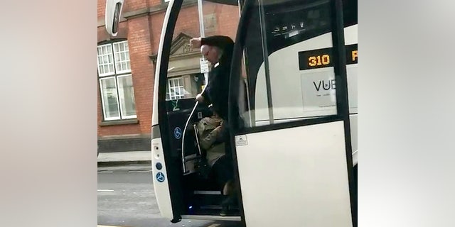 Mobile footage filmed by another passenger captured the moment the National Express driver hauled the woman down the steps of the coach.