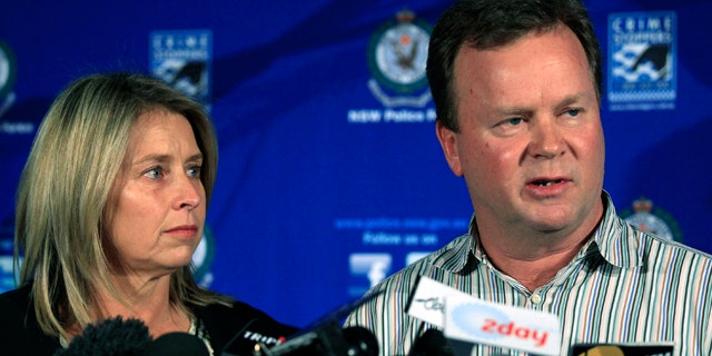 Aug. 4: William Pulver, right, makes a statement as his wife Belinda listens in Sydney, a day after their daughter Madeleine was chained to a fake bomb for 10 hours.