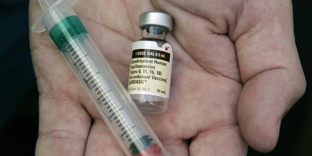 Aug. 28, 2016: In this file photo a doctor holds a vial of HPV vaccine Gardasil.