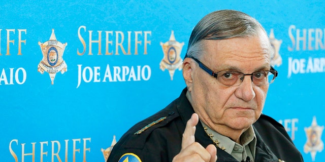 FILE - In this Dec. 18, 2013, file photo, Maricopa County Sheriff Joe Arpaio speaks at a news conference at Maricopa County Sheriff's Office Headquarters in Phoenix. The Arizona sheriff known for clashing with the federal government and cracking down on illegal immigration will face a civil contempt-of-court hearing because his office repeatedly violated orders issued in a racial-profiling case, a U.S. judge said Thursday, Feb. 12, 2015. (AP Photo/Ross D. Franklin, File)