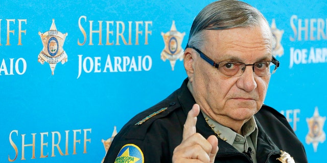 FILE - In this Dec. 18, 2013, file photo, Maricopa County Sheriff Joe Arpaio speaks at a news conference at Maricopa County Sheriff's Office Headquarters in Phoenix. The Arizona sheriff known for clashing with the federal government and cracking down on illegal immigration will face a civil contempt-of-court hearing because his office repeatedly violated orders issued in a racial-profiling case, a U.S. judge said Thursday, Feb. 12, 2015. (AP Photo/Ross D. Franklin, File)