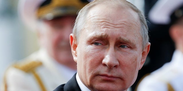 FILE -- July 30, 2017: Russian President Vladimir Putin attends the Navy Day parade in St. Petersburg, Russia.
