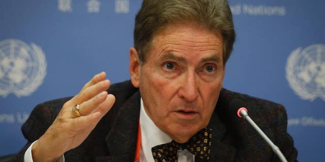 Alfred de Zayas, U.N. independent expert on international order, hold a news conference calling for the abolition of tax havens, Friday, Oct. 21, 2016, at U.N. headquarters. (AP Photo/Bebeto Matthews)