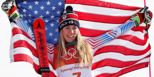 Women's Giant Slalom gold medalist Mikaela Shiffrin of the U.S. celebrates during the Olympic victory ceremony in Pyeongchang.