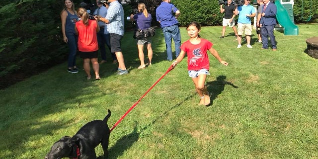 The Ragusos, a gold star family, welcomes their new puppy, Calvin.