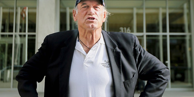 In this Oct. 20, 2015, file photo, former Minnesota governor and professional wrestler Jesse Ventura talks to reporters outside the federal building in St. Paul, Minn.