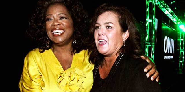 Oprah Winfrey, Chairman, CEO, and Chief Creative Officer of OWN: Oprah Winfrey Network, poses with Rosie O'Donnell at their Television Critics Association presentation on July 29, 2011. (Reuters)