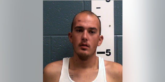 This undated booking photo provided by the Las Cruces Police Department shows Michael Derby. Authorities in southern New Mexico searched Thursday, May 12, 2016, for Derby, a jail inmate who escaped from a medical clinic after he was accused of kidnapping a driver by gunpoint in Texas and twice leading police on car chases. Police in the city of Las Cruces said Derby, is dangerous and urged the public to report tips on his whereabouts after he fled the clinic where he was taken for a medical exam Wednesday night. (Dona Ana County Detention Center/Las Cruces Police Department via AP)
