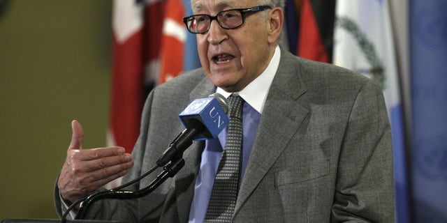 FILE - In this Nov. 29, 2012 file photo, Lakhdar Brahimi, Joint Special Representative of the United Nations and the League of Arab States for Syria, answers media questions after consultations at United Nations headquarters. A government airstrike on a bakery in a rebel-held town in central Syria killed more than 60 people, activists said, casting a pall over a visit by Brahimi, the international envoy charged with negotiating an end to the country's civil war. (AP Photo/Richard Drew, File)