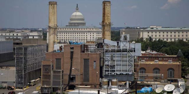 The Capitol Dome is seen behind the Capitol Power Plant in Washington, Monday, June 24, 2013. The plant provides power to buildings in the Capitol Complex.