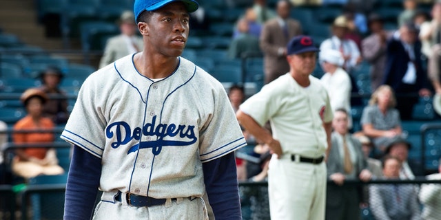 This film image released by Warner Bros. Pictures shows Chadwick Boseman as Jackie Robinson in a scene from "42."
