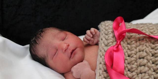 This photo provided by the Wichita Police shows Sofia Victoria Gonzalez Abarca, a missing week-old baby in Wichita, Kan. Authorities are searching for the missing week-old baby after her mother was found fatally shot in Wichita. A relative found the woman dead Thursday, Nov. 17, 2016, in her apartment. Sgt. Nikki Woodrow says the woman's daughter, Sofia Victoria Gonzalez Abarca, is "considered missing and endangered." (Wichita Police via AP)