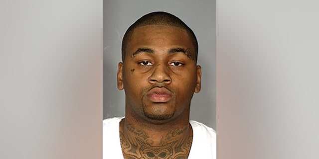 FILE - This 2012 file booking photo provided by the Las Vegas Metropolitan Police Department shows Ammar Harris. Harris is due for arraignment in state court in a shooting and fiery crash that killed three people on the Las Vegas Strip and felony sex assault charges in a 2010 rape case. The self-described pimp could face the death penalty in the Feb. 21 carnage on the Strip, although prosecutors have not made a decision yet. (AP Photo/Las Vegas Metropolitan Police Department, File)