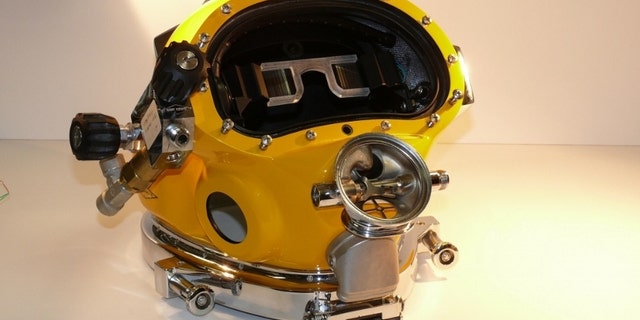 Prototype of the Divers Augmented Vision Display (DVAD) positioned within a dive helmet.