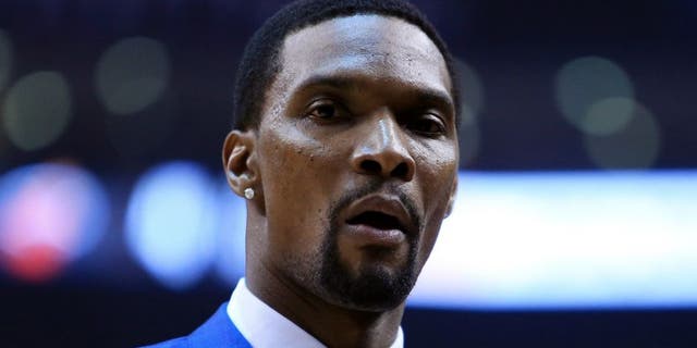 TORONTO, ON - MAY 03: Chris Bosh #1 of the Miami Heat looks on from the bench in the first half of Game One of the Eastern Conference Semifinals against the Toronto Raptors during the 2016 NBA Playoffs at the Air Canada Centre on May 3, 2016 in Toronto, Ontario, Canada. NOTE TO USER: User expressly acknowledges and agrees that, by downloading and or using this photograph, User is consenting to the terms and conditions of the Getty Images License Agreement. (Photo by Vaughn Ridley/Getty Images)