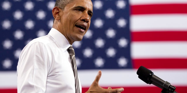 FILE - In this April 24, 2012 fie photo, President Barack Obama speaks at University of Colorado in Boulder, Colo. Sure, there's always handwringing about money in politics. This time really is different _ the first presidential race since the courts pulled out the stops, freeing billionaires and businesses to write multimillion-dollar checks for their pet candidates. It's the Year of Big Money. (AP Photo/Carolyn Kaster, File)