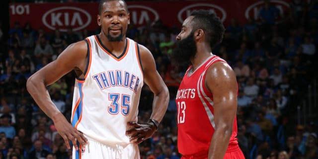 OKLAHOMA CITY, OK- JANUARY 29: Kevin Durant #35 of the Oklahoma City Thunder and James Harden #13 of the Houston Rockets talk during the game on January 29, 2016 at Chesapeake Energy Arena in Oklahoma City, Oklahoma. NOTE TO USER: User expressly acknowledges and agrees that, by downloading and or using this photograph, User is consenting to the terms and conditions of the Getty Images License Agreement. Mandatory Copyright Notice: Copyright 2016 NBAE (Photo by Layne Murdoch Jr./NBAE via Getty Images)