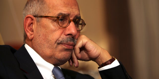 FILE - In this Saturday, Nov. 24, 2013 file photo, leading democracy advocate Mohammed ElBaradei speaks to a handful of journalists including the Associated Press, at his home on the outskirts of Cairo, Egypt. Security was beefed up around Egypt’s opposition leaders on Thursday, Feb. 7, 2013 after several hardline Muslim clerics issued religious edicts calling for them to be killed, raising fears of assassinations similar to that of a Tunisian opposition leader gunned down a day earlier. A security official said ElBaradei’s home and several other leaders’ homes will be put under observation for their protection.(AP Photo/Thomas Hartwell, File)