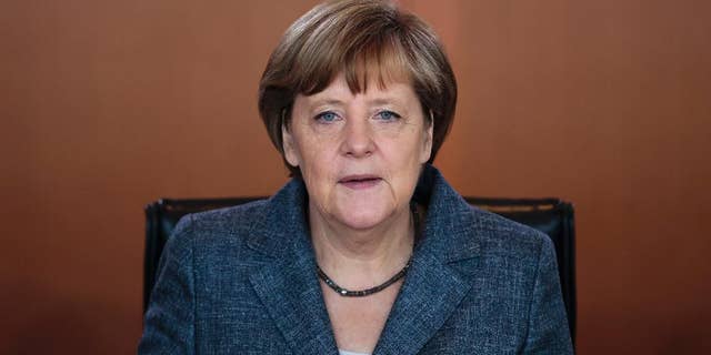 German Chancellor Angela Merkel arrives for the German government's weekly cabinet meeting at the chancellery in Berlin, Germany, Wednesday, June 3, 2015. (AP Photo/Markus Schreiber)