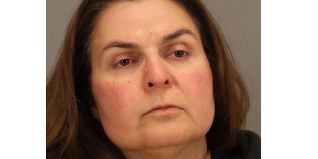 In this April 29, 2013 photo released by the San Jose Police Department is Ramineh Behbehanian, 50. Behbehanian is facing attempted murder charges after authorities say she tried to sneak orange juice bottles spiked with rubbing alcohol inside a Starbucks.