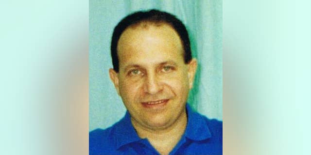 In this undated photo provided by the Sarraff family shows Rolando Sarraff Trujillo in an unknown location. A former intelligence official in the United States Thursday publically identified Sarraff as the unnamed spy traded for three Cuban intelligence agents jailed in the United States, one who U.S. President Barrack Obama hailed as Washingtons most valuable assets. Before his downfall, Sarraff helped the U.S. crack the "Wasp Network," in Florida, a Cuban spy ring that included members of the Cuban Five, the last three of whom were released in exchange for the Cuban spy. (AP Photo/Courtesy Sarraff family)