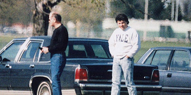 This undated surveillance photo released by the U.S. Attorney's Office at federal court in Boston shows James "Whitey" Bulger, left, with his former right-hand man, Kevin Weeks.