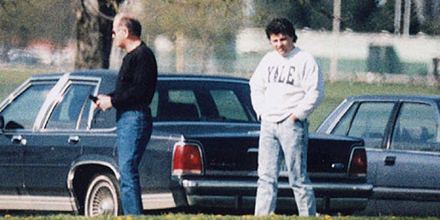 This undated surveillance photo released by the U.S. Attorney's Office at federal court in Boston shows James "Whitey" Bulger, left, with his former right-hand man, Kevin Weeks.